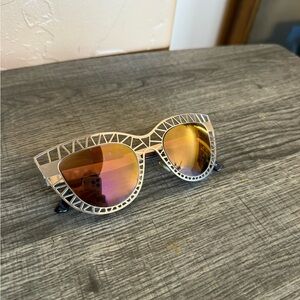 Cat eye fashion sunglasses with cutouts geometric gold and holo lenses